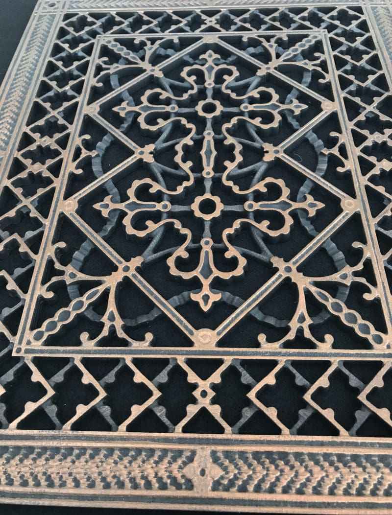 Historic Reproduction grilles Close up of 3-dimensional design details of 12" x 16" Craftsman style Arts and Crafts decorative grille in Rubbed Bronze finish.