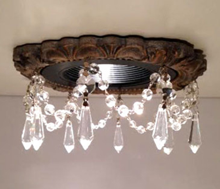 Recessed light trim embellished with single swag of clear 1-1/2" U-drop crystals.