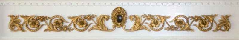 fireplace undermantle ornamentation with granite center