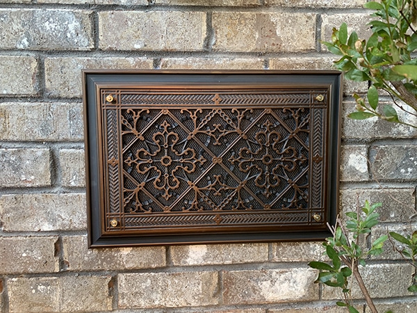 Foundation Vent Cover in Arts and Crafts Style in Rubbed Bronze Finish.