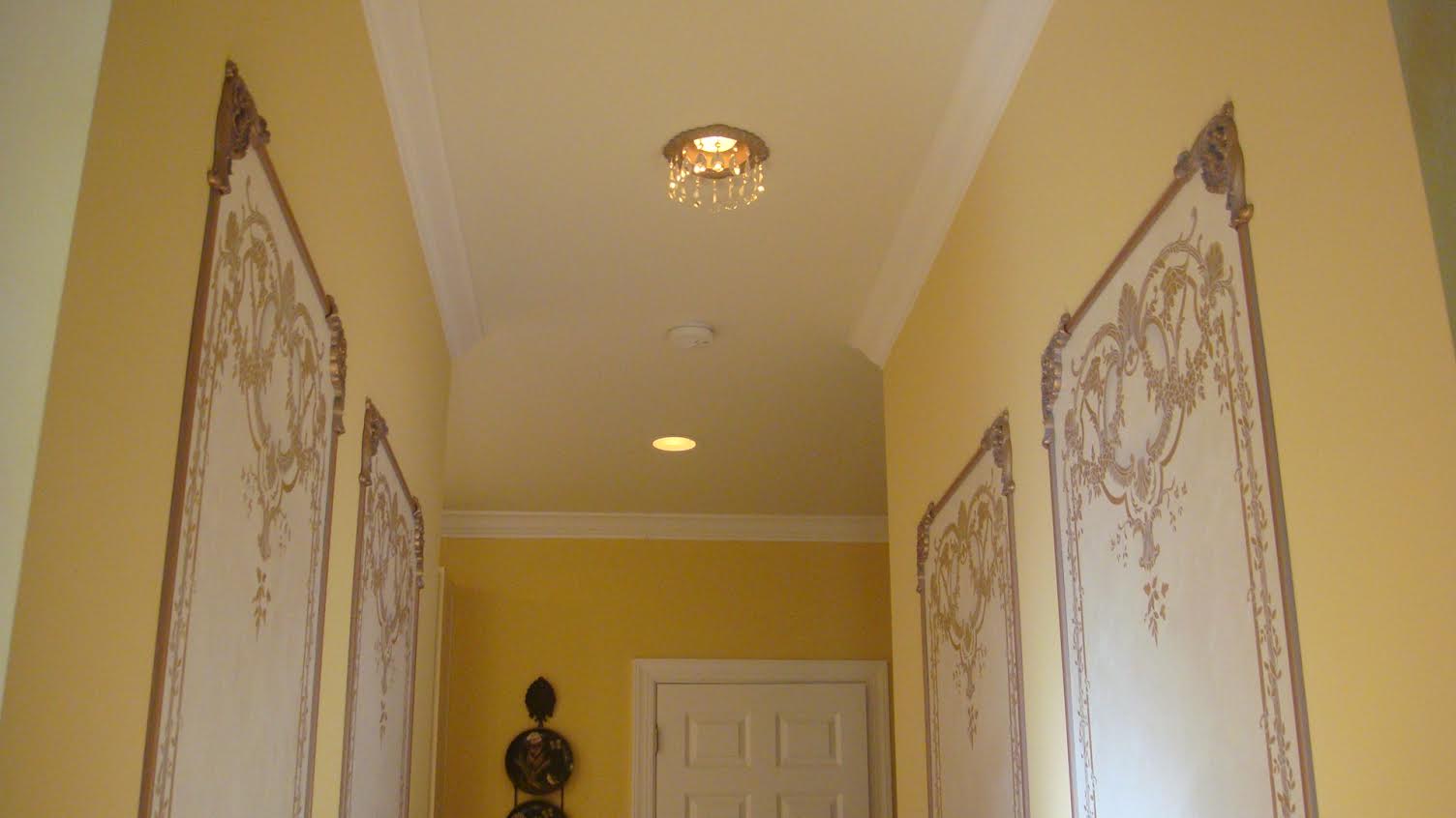recessed chandeliers in a hallway