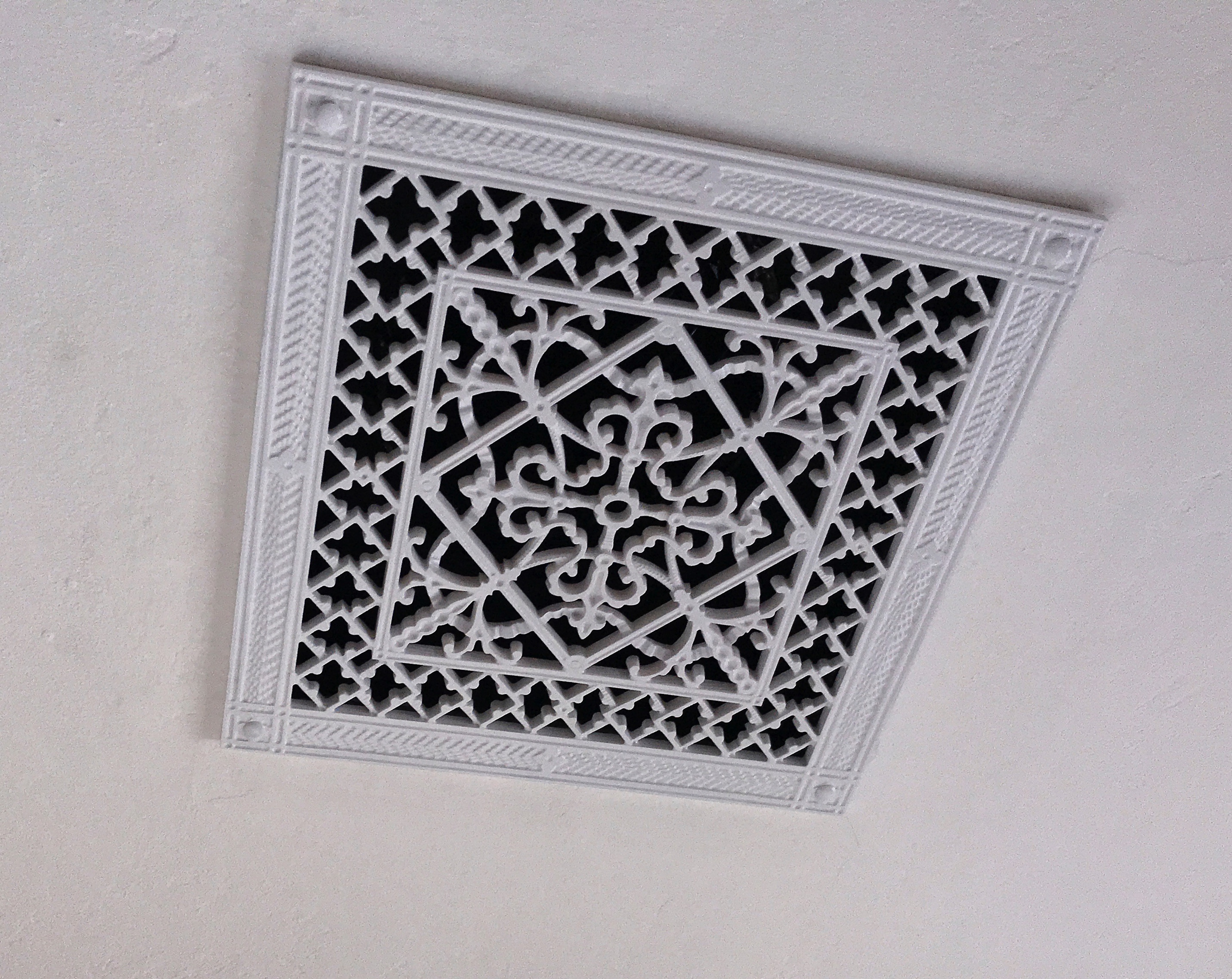 Decorative Vent Cover in Arts and Crafts Style installed on the ceiling