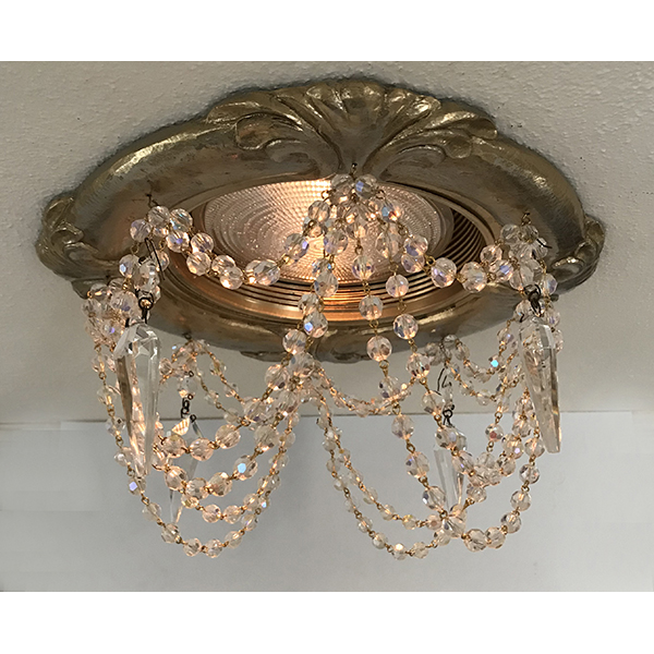 Recessed chandelier with Tuscany style decorative trim with multi strands of crystal chain and clear cut crystal prism