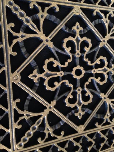 Close up detail of the Arts and Crafts decorative vent cover.