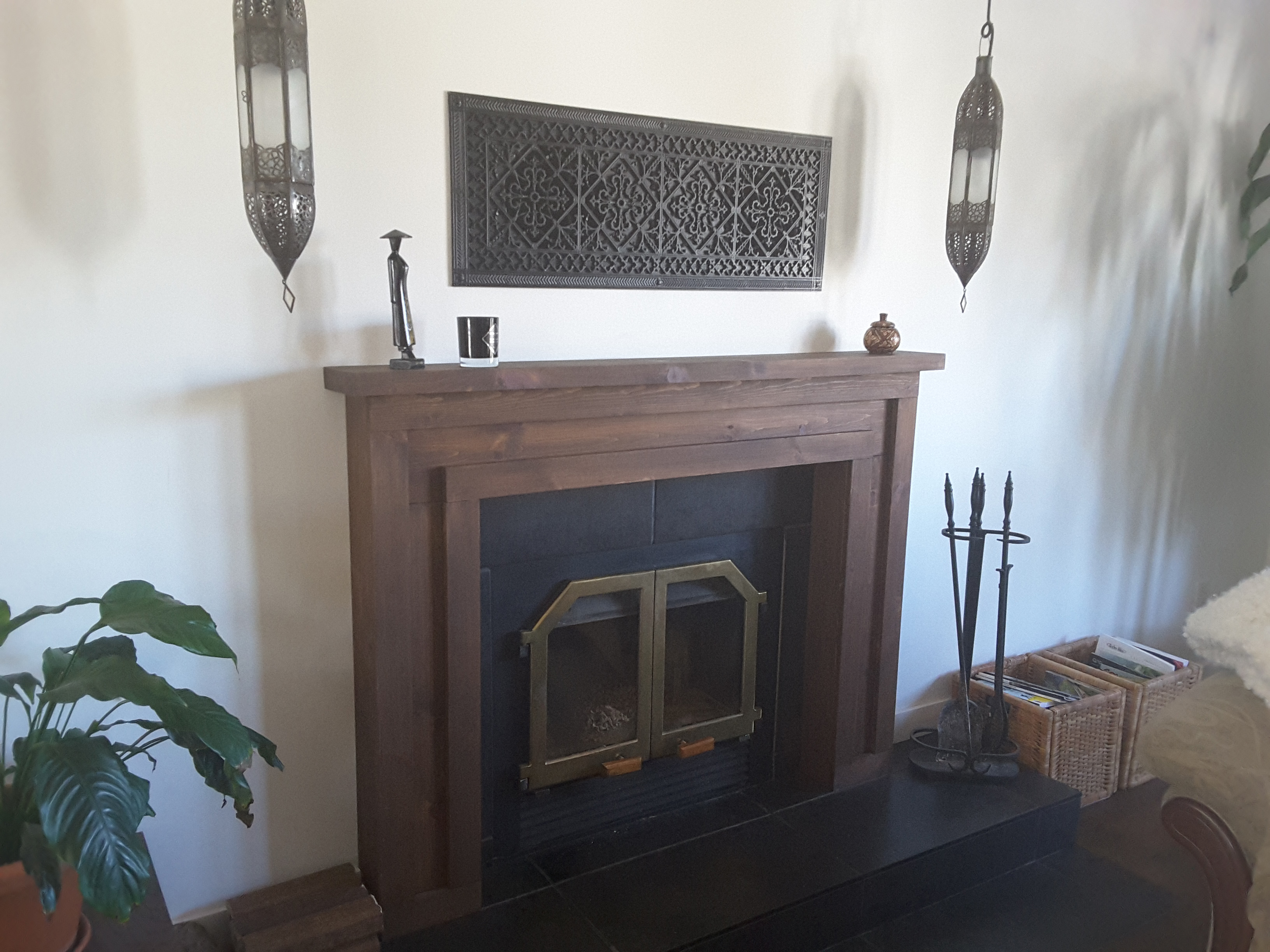 Fireplace heatolator with arts and crafts decorative grille