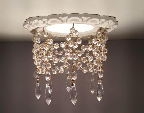 Recessed light trim embellished with crystal swages and 1-1/2" U-Drop crystals.