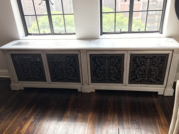 Custom radiator cabinet with Louis XIV decorative radiator cover grilles.