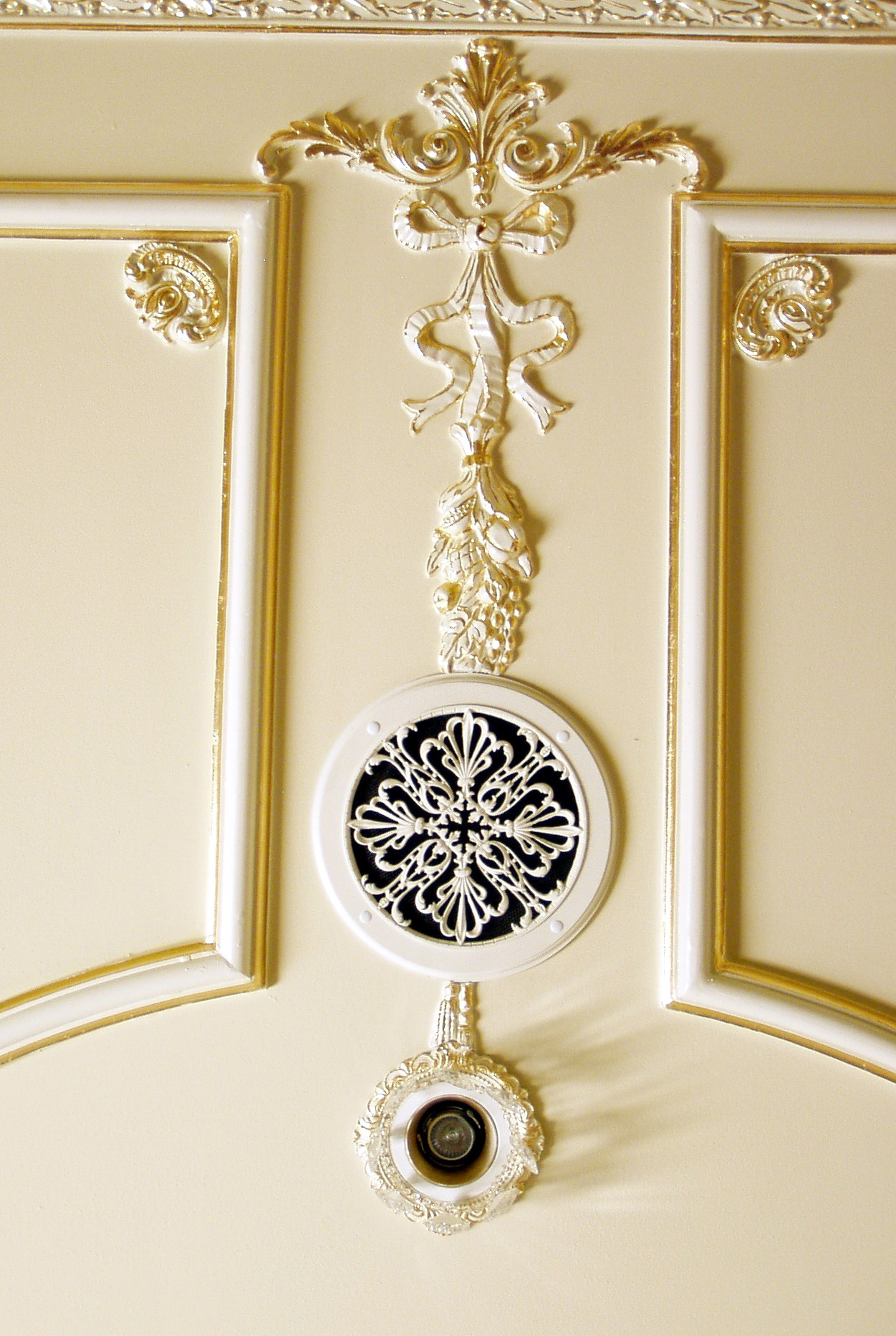 Speaker Grille and Decorative recessed light trim in this classical ceiling design.