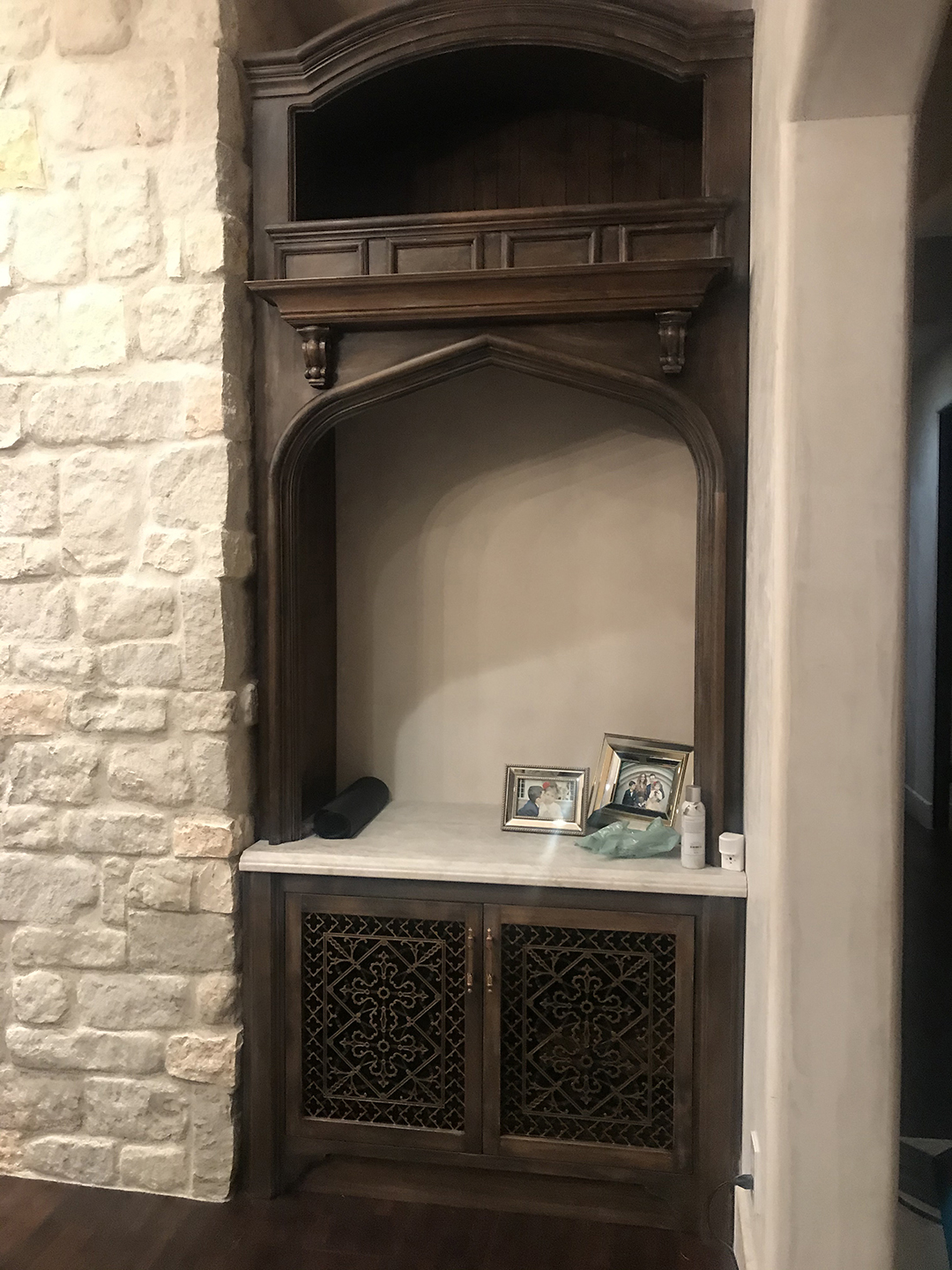 Cabinet with cabnet door grille in Craftsman style Arts and Crafts design.