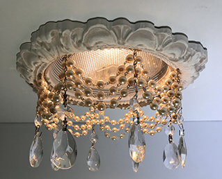 Recessed chandelier with 4 pearl swags and teardrop crystals.