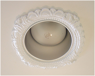 decorative recessed light trim with a baffle and incandescent bulb