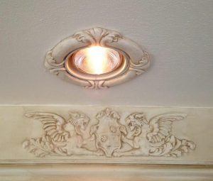 Decorative recessed light trim in Tuscany Style.