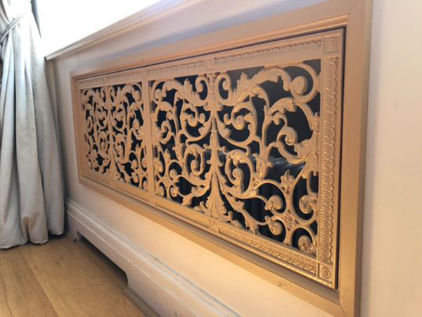 French style Louis XIV decorative grille radiator cabinet in a custom finish. The cabinet designed by SOSA Joinery.
